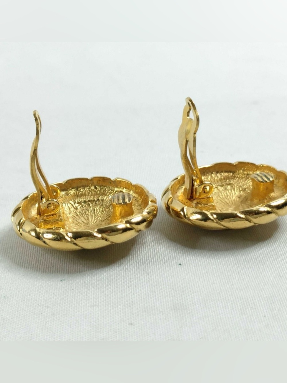 A Pair of Vintage Chanel Gold-Tone CC Medallion Button Clip-On Earrings - Picture 6 of 10